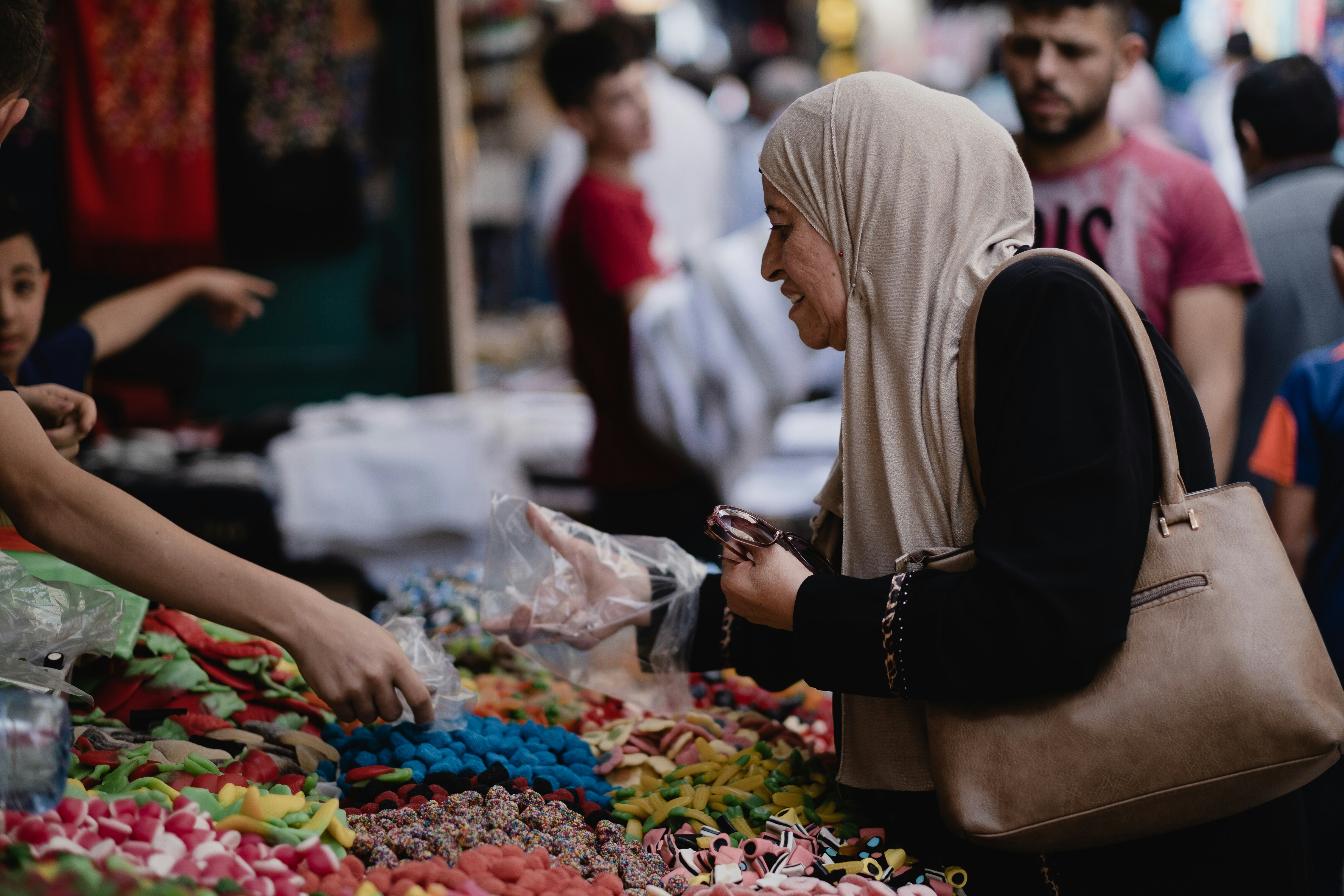 woman in white hijab and black dress